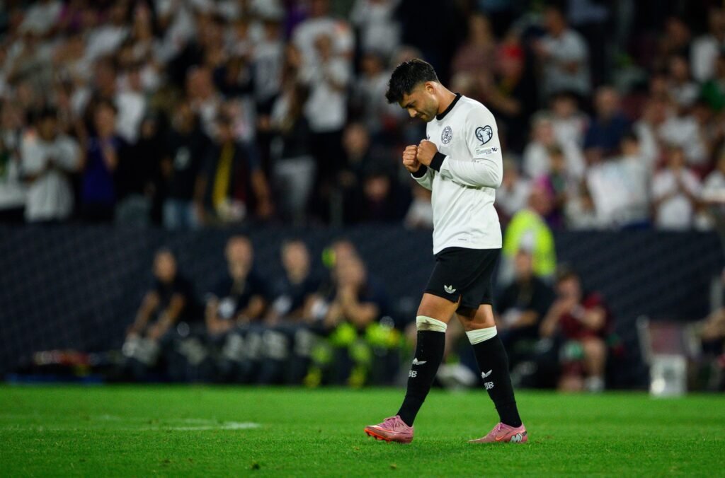 COLOGNE, GERMANY - SEPTEMBER 07: Nadiem Amiri of Germany celebrates victory after the FIFA World Cup 2026 qualifier match between Germany and Northern Ireland at RheinEnergieStadion on September 07, 2025 in Cologne, Germany. (Photo by Marvin Ibo Guengoer - GES Sportfoto/Getty Images)