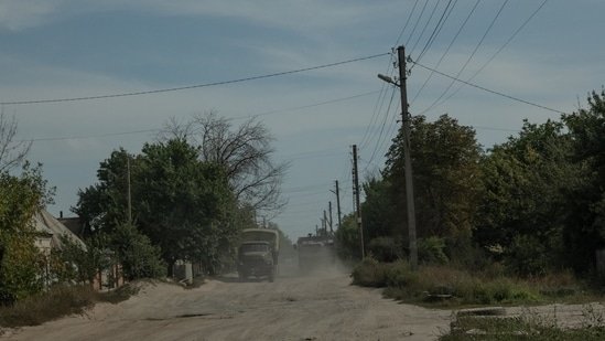 Military trucks on an unpaved road in the Donetsk region of Ukraine.(Agency)