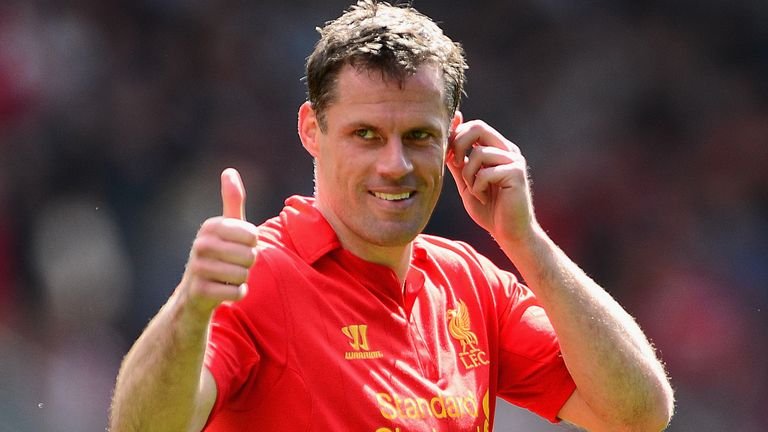 Jamie Carragher in 2013 playing for Liverpool against Everton
