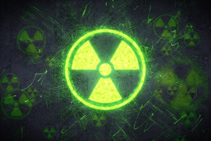 Glowing green radiation fallout sign.
