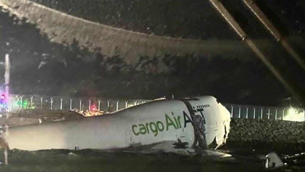 2 dead after Emirates plane slides off Hong Kong runway, apparently hits ground vehicle