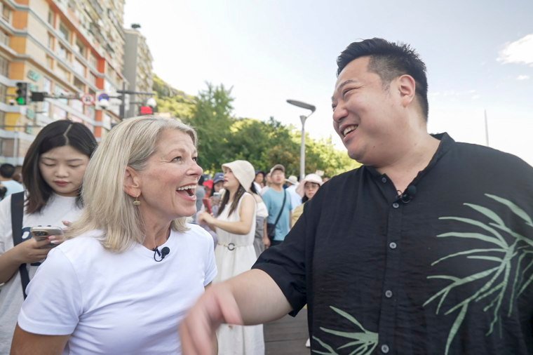 Chen with NBC News’s Janis Mackey Frayer in Chongqing, China, last month.