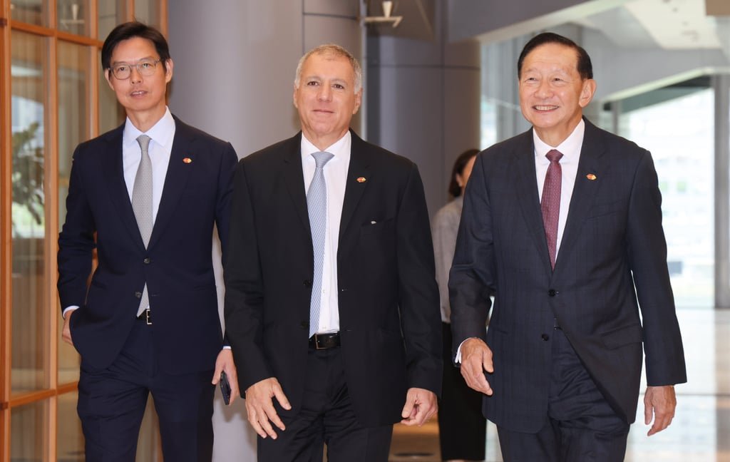 (Left to right) HSBC’s co-CEO of Asia and the Middle East David Liao Yi Chien, group CEO Georges Elhedery, and chairman of The Hongkong and Shanghai Banking Corporation Peter Wong Tung-shun at HSBC’s main building in Central on October 9, 2025. Photo: Jelly Tse