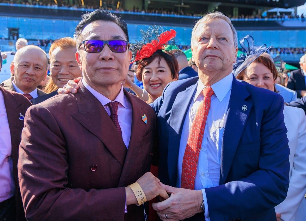 Winfried Engelbrecht-Bresges (right) congratulates Ka Ying-Rising’s owner Leung Shek-kong. Photo: HKJC