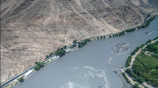 An aerial view shows the Kunar river running past a hillside in Kunar province on September 14 (AFP)