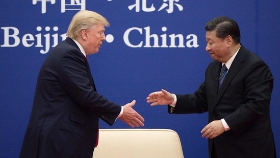File photo of China's President Xi Jinping with US President Donald Trump. (AFP)