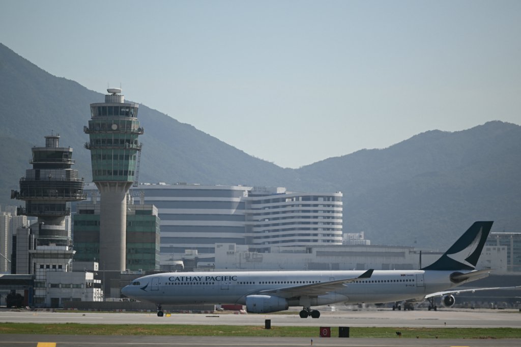 Cargo Plane Skids Off Hong Kong Runway Into Sea, Two Killed
