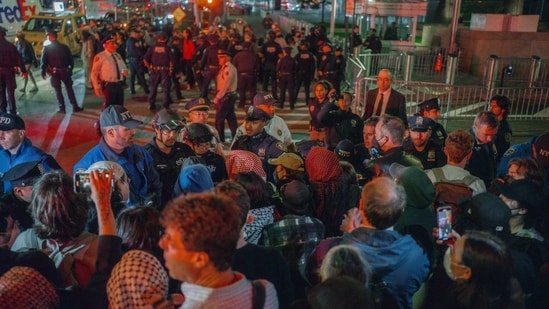 Protesters face off with police during a protest against immigration crackdown in the aftermath of a raid on Tuesday, Oct. 21, 2025, in New York.(AP)