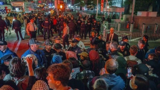 Protesters face off with police during a protest against immigration crackdown in the aftermath of a raid on Tuesday, Oct. 21, 2025, in New York.(AP)