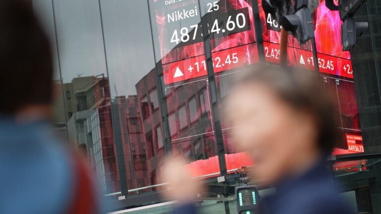 Stocks rise and push the Dow to another record