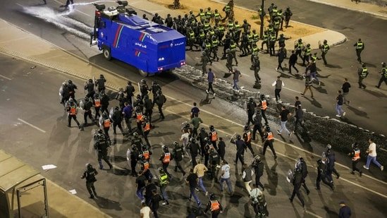 Some 409 individuals were taken into police custody.(AFP)