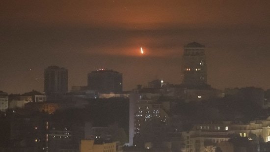 An explosion of a drone is seen in the sky over the city during a Russian missile and drone strike, amid Russia's attack on Ukraine on October 22, 2025. (REUTERS)