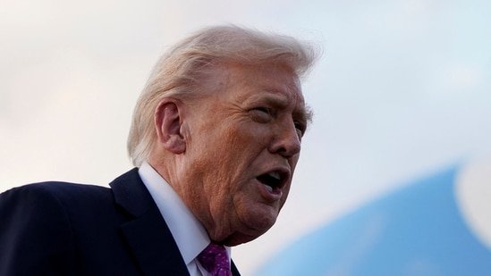 US President Donald Trump disembarks Air Force One at Palm Beach International Airport, in West Palm Beach, Florida.(REUTERS)