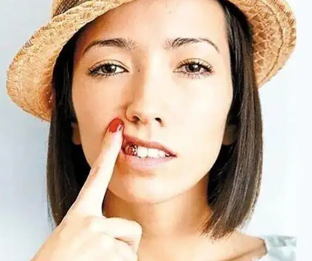 Dental institutions across China are offering the “tooth tattoo” service as a free add-on to attract customers. Photo: Handout