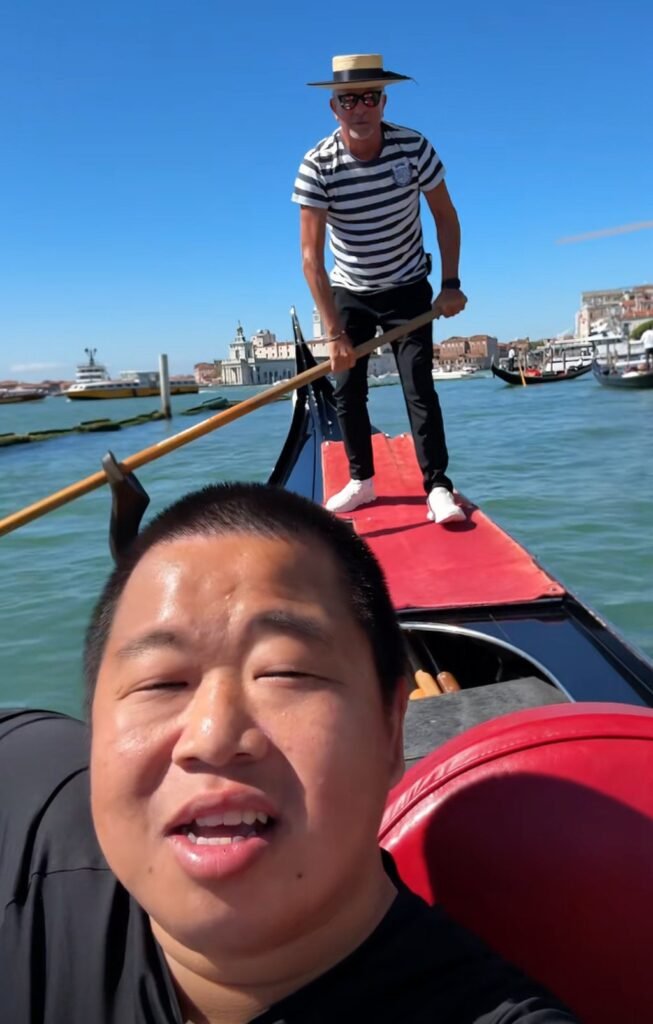 Lan Zhanfei enjoys a gondola ride. His travel exploits are legendary among his fans. Photo: Handout