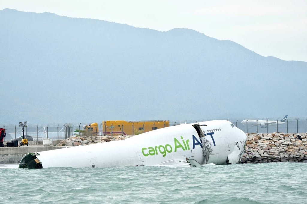 The wreckage of the cargo plane on the shore near Hong Kong International Airport’s north runway. Photo: Sam Tsang