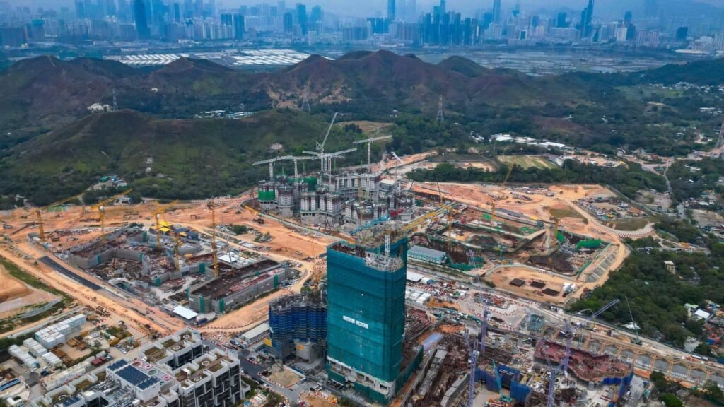 Hong Kong’s Paul Chan meets Xia Baolong on trip to Beijing, Hebei projects