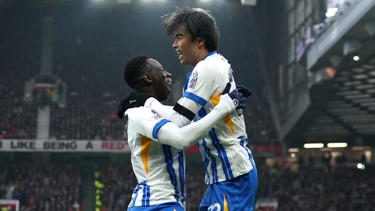 Yankuba Minteh celebrates his goal with team-mate Kaoru Mitoma