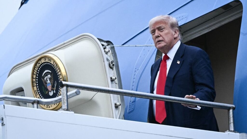 President Donald Trump disembarks from Air Force One.