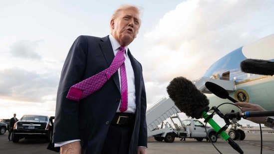 US President Donald Trump speaks to the press after disembarking from Air Force One upon arrival at Palm Beach International Airport in West Palm Beach, Florida, October 17, 2025.(AFP)