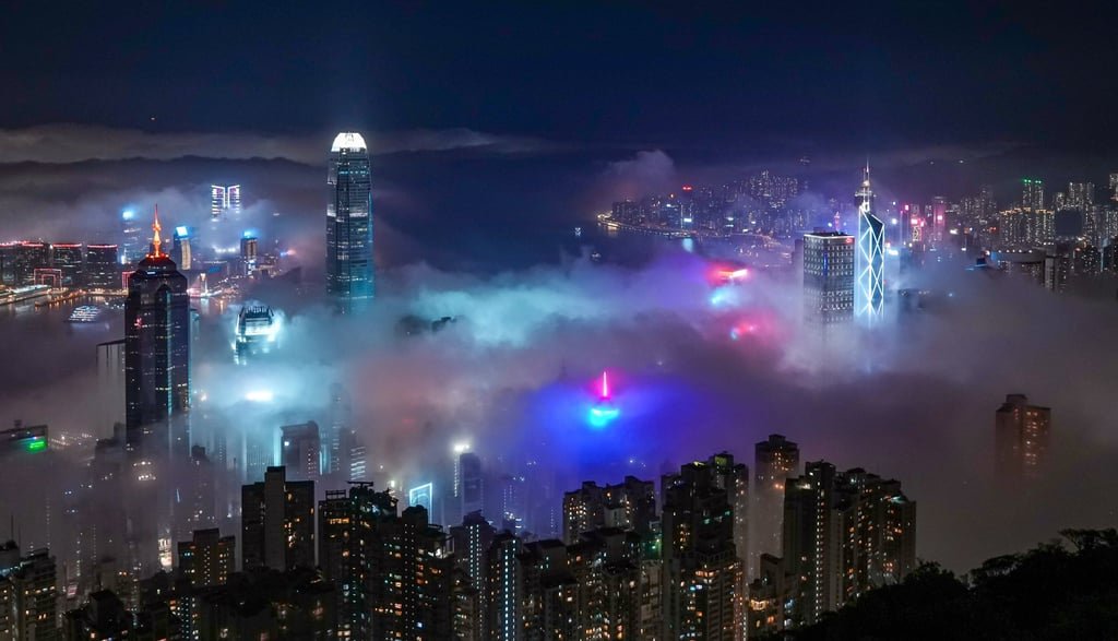 Victoria Harbour submerged in a sea of clouds. Photo: Eugene Lee