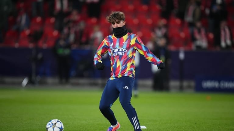 Arsenal's Max Dowman warms up prior to the Champions League...