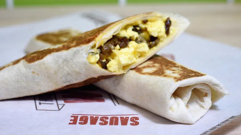 Grilled breakfast burrito from Taco Bell on paper