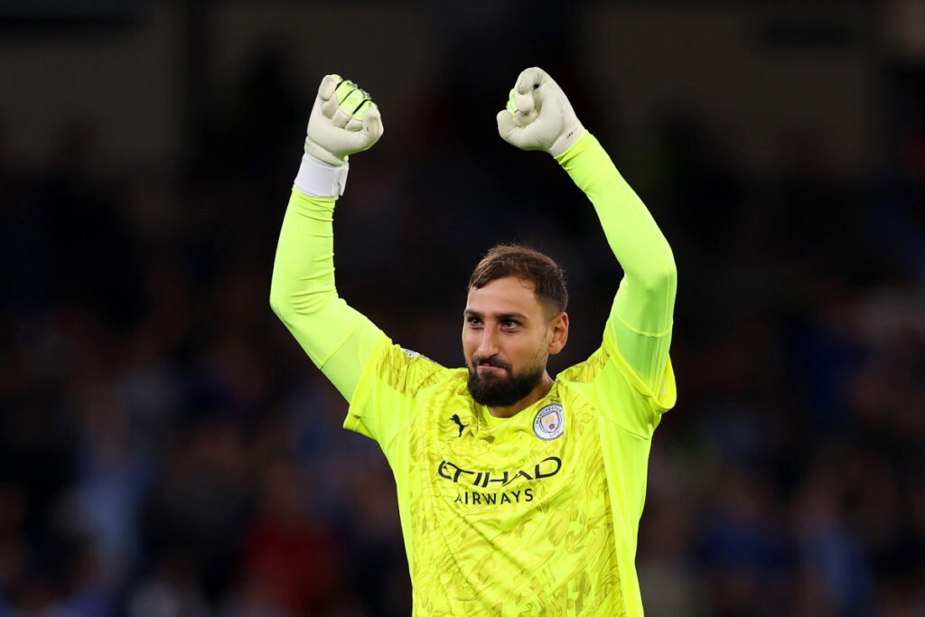 MANCHESTER, ENGLAND - SEPTEMBER 18: Gianluigi Donnarumma of Manchester City celebrates his team's second goal scored by teammate Jeremy Doku (not pictured) during the UEFA Champions League 2025/26 League Phase MD1 match between Manchester City and SSC Napoli at City of Manchester Stadium on September 18, 2025 in Manchester, England. (Photo by Ryan Pierse/Getty Images)